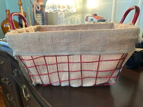 Kirkland’s red wire basket with burlap